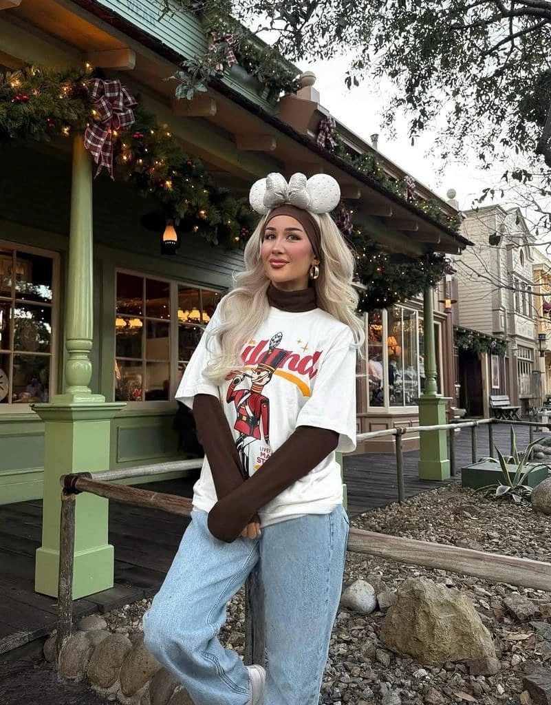 4- Graphic Disney Tee over a Brown Roll Neck