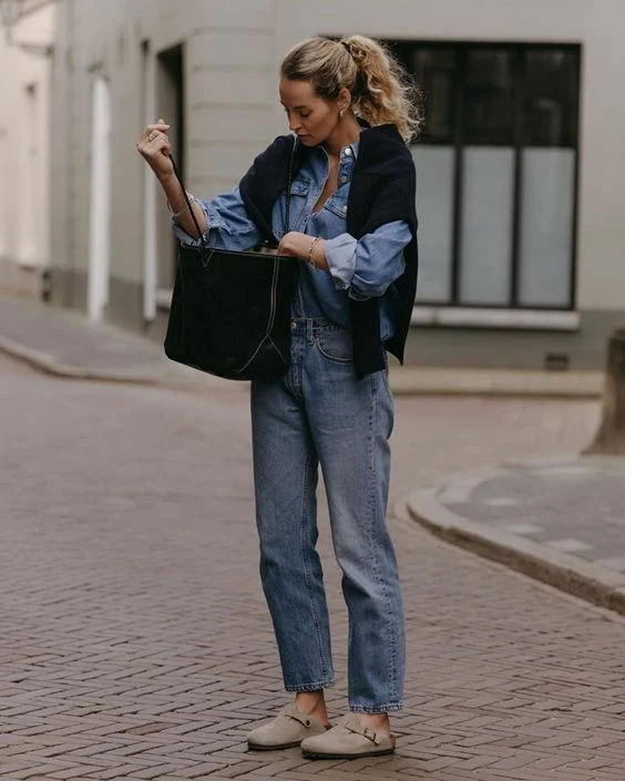 Anouk in a denim-on-denim outfit with Birkenstock Boston clogs.
