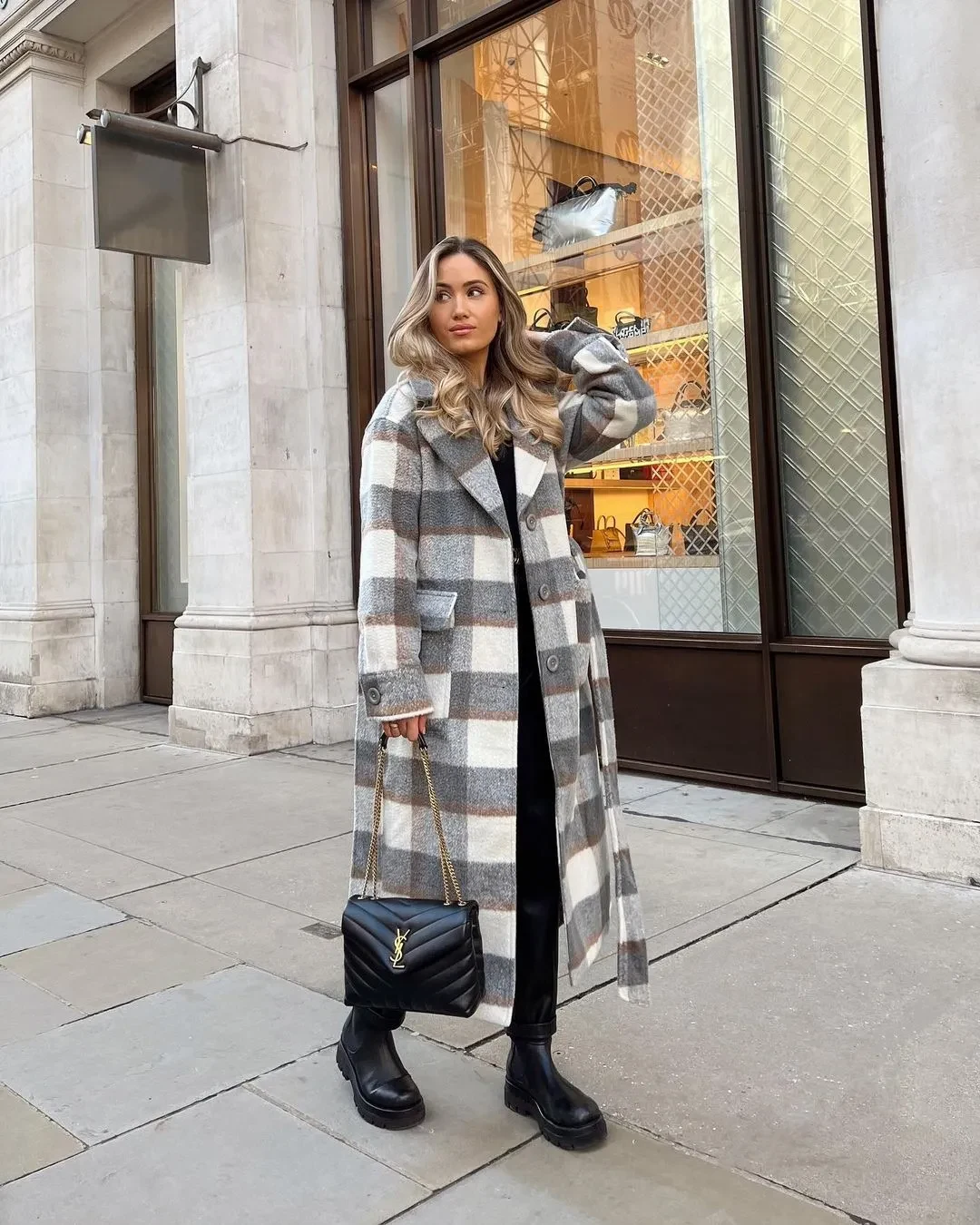 Layered comfort meets fashion with a long plaid shacket and classic Chelsea boots. Perfect for casual outings, this cozy ensemble balances warmth and trendiness seamlessly.