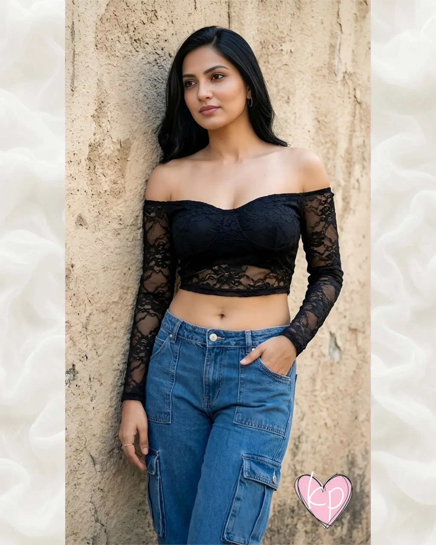 Off-the-shoulder black lace long-sleeve crop top styled with light-colored bottoms.