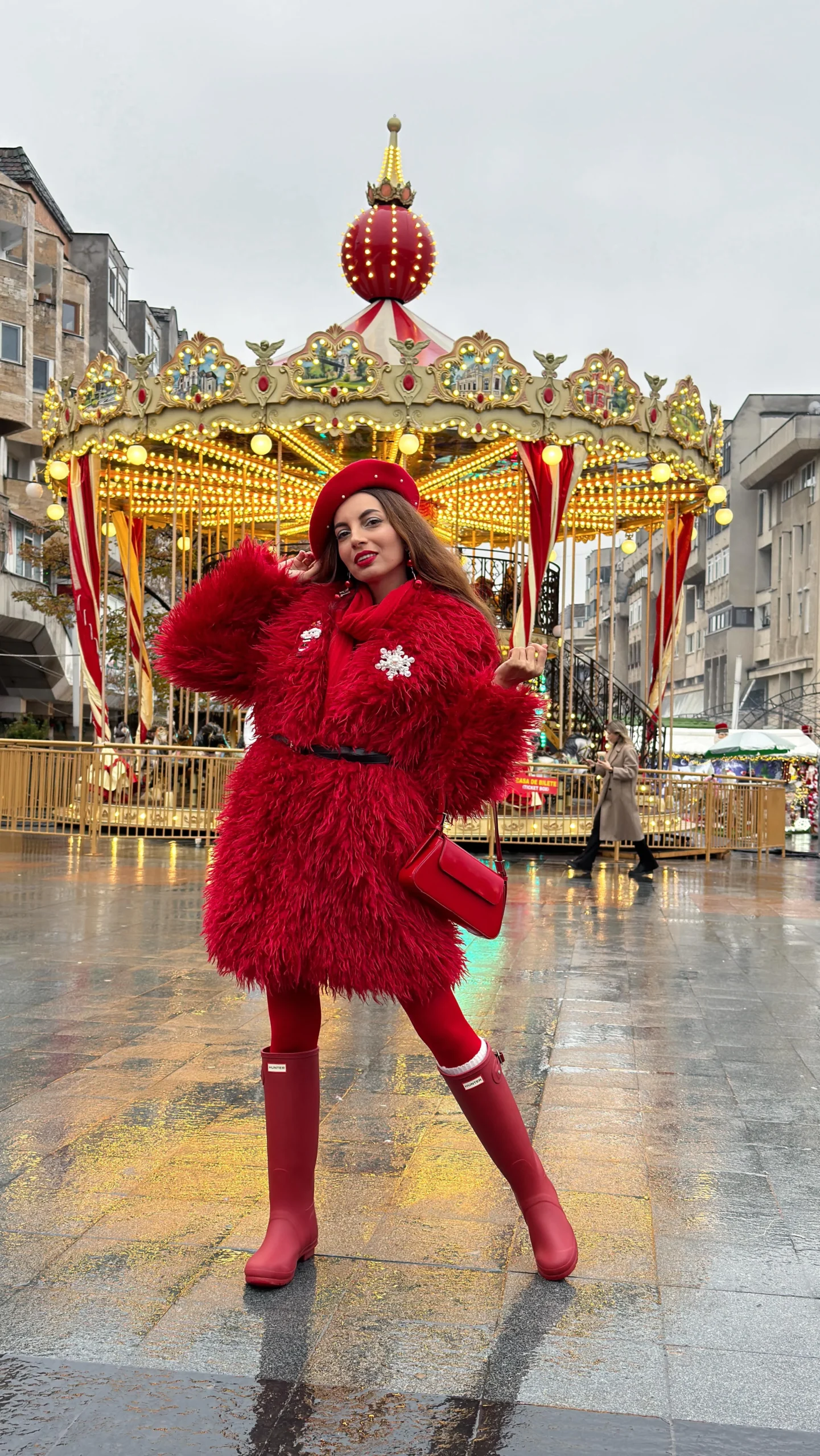 Fluffy red fur coat, red dress, red tights, red Hunter boots, red beret, white snowflake brooch