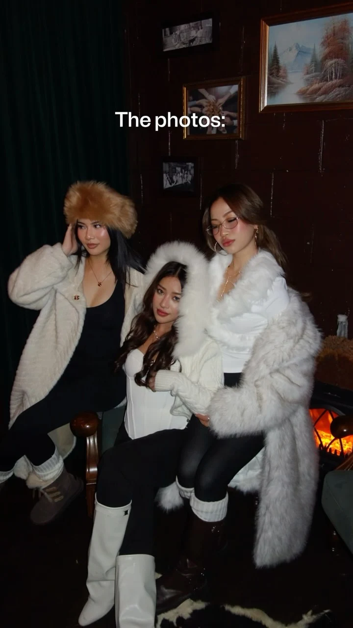 White hooded puffer jacket, white corset top, black pants, white knee-high boots