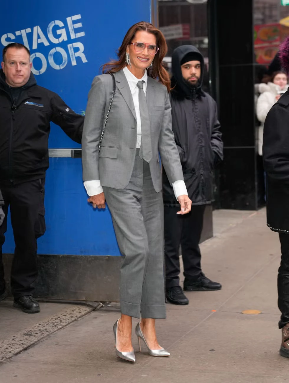 Brooke Shields leaving ABC Television Studios in New York City wearing a long structured coat.