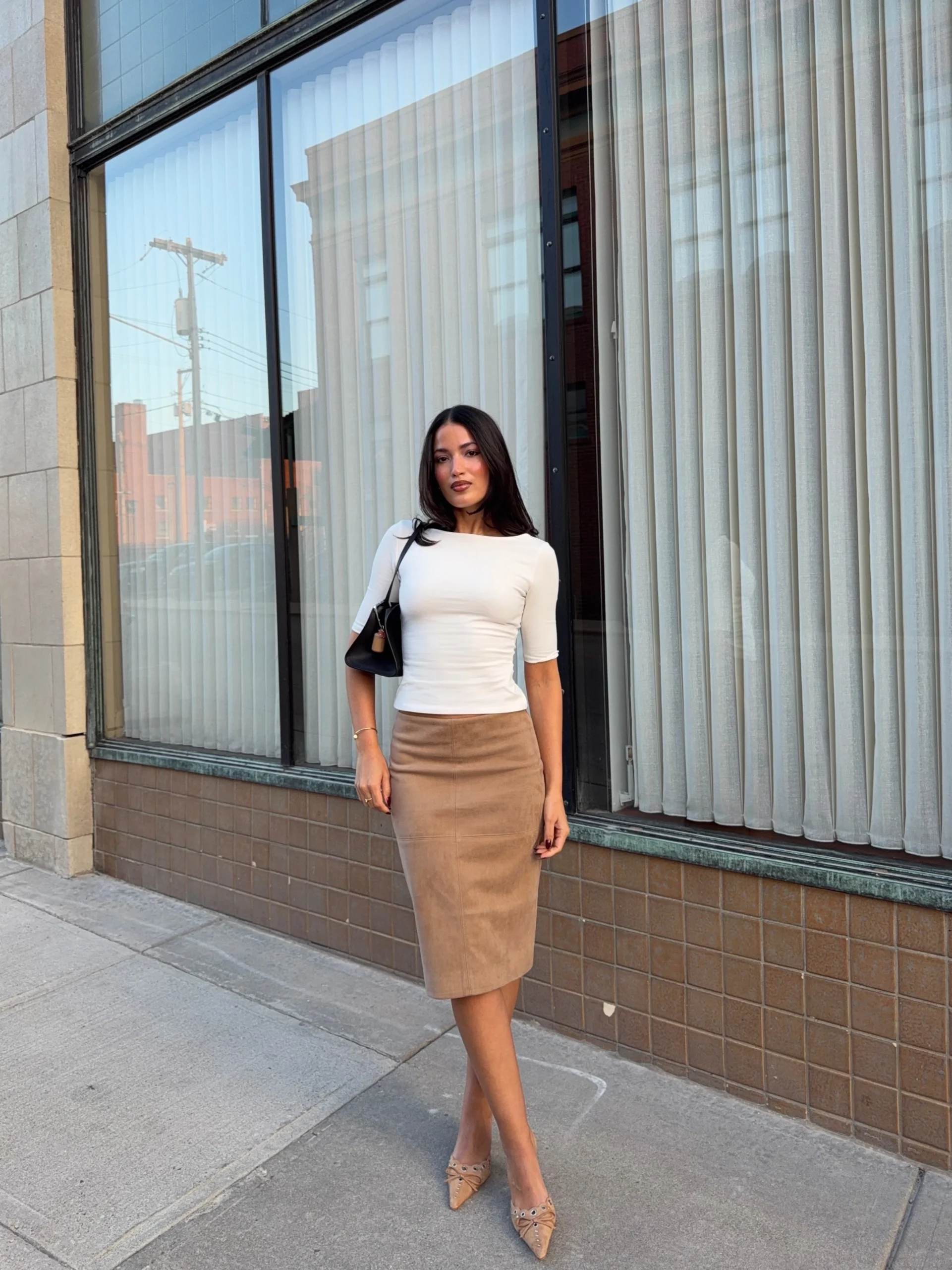 white t-shirt, brown suede mini skirt, black ankle boots