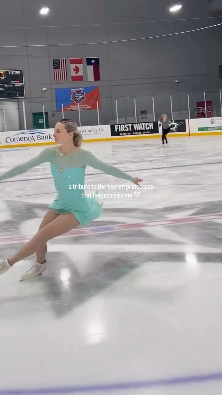 Figure skater gliding on ice in a mint green long-sleeved dress and white skates.