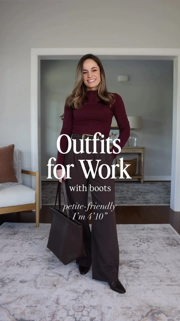 Woman in an all-black cardigan, wide-leg trousers, pumps, and small shoulder bag.