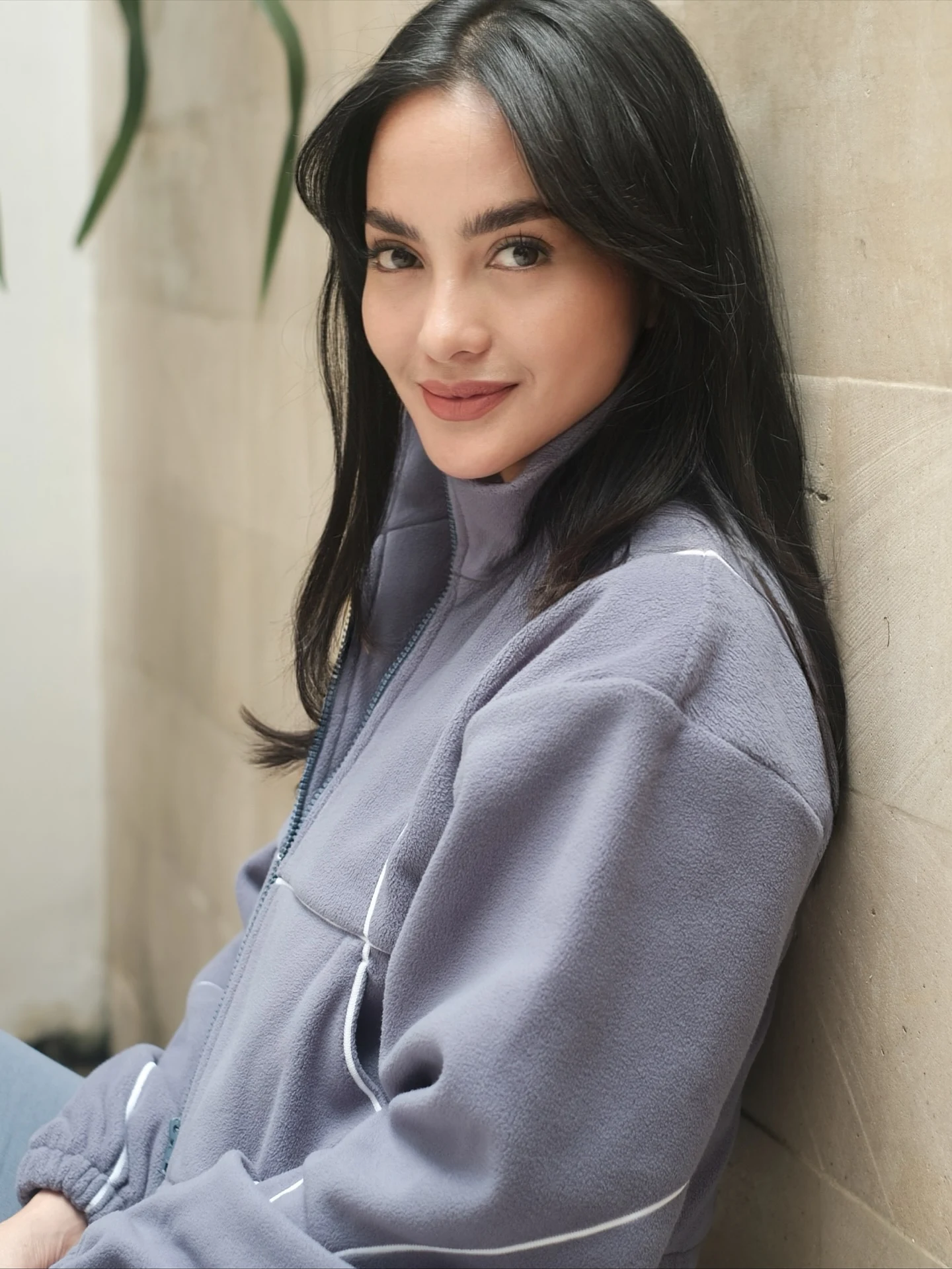 Loose lavender-gray zip jacket with white piping details and a high stand collar.