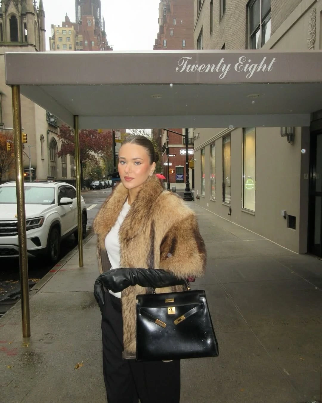 11- Brown Fur and Black Wide-Leg Trousers