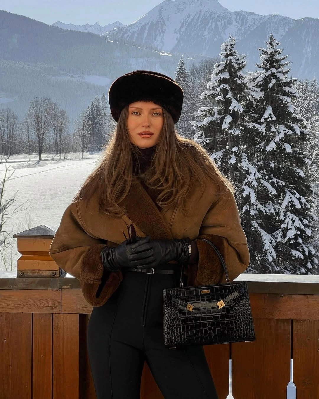 13- Brown Shearling Jacket and Black Leggings